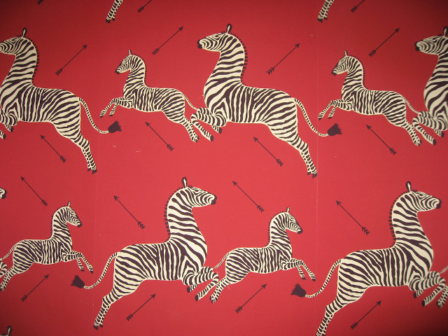 Zebras red background arrows pattern free wallpaper for desktop - medium preview image