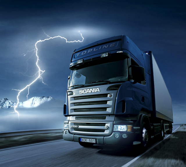 Truck driving road cloudy sky free wallpaper for tablet - medium preview image