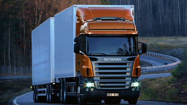 Truck driving road forest night free wallpaper for desktop - medium preview image