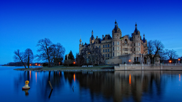 Castle clocktower night water boat free wallpaper for desktop - medium preview image