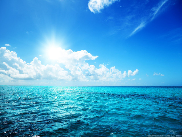 Bright blue sky clouds ocean free wallpaper for desktop - medium preview image
