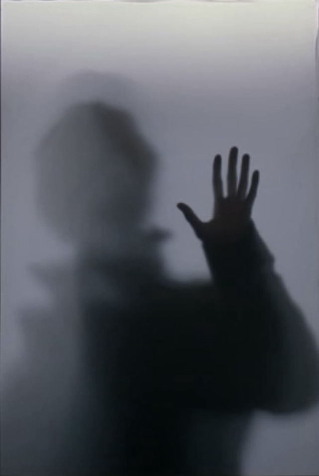 Person hand shadow wall behind free wallpaper for mobile - medium preview image