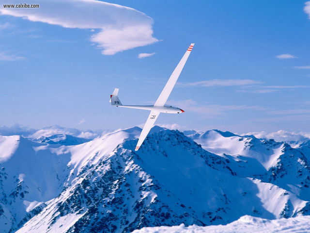 Glider flying snowy mountain range free wallpaper for desktop - medium preview image