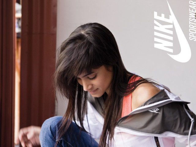 Girl sitting floor cellphone nike free wallpaper for desktop - medium preview image