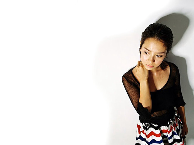 Woman black top colorful skirt #3 free wallpaper for desktop - medium preview image