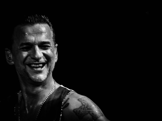 Man tattoo smiling camera black free wallpaper for desktop - medium preview image