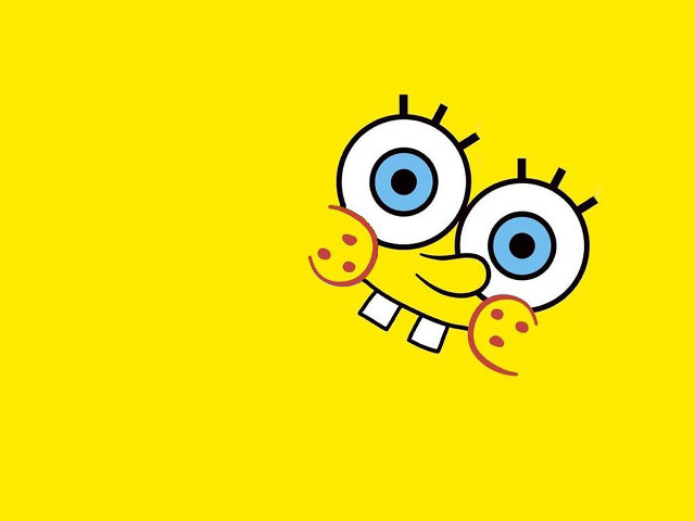 Yellow cartoon face happy eyes free wallpaper for desktop - medium preview image