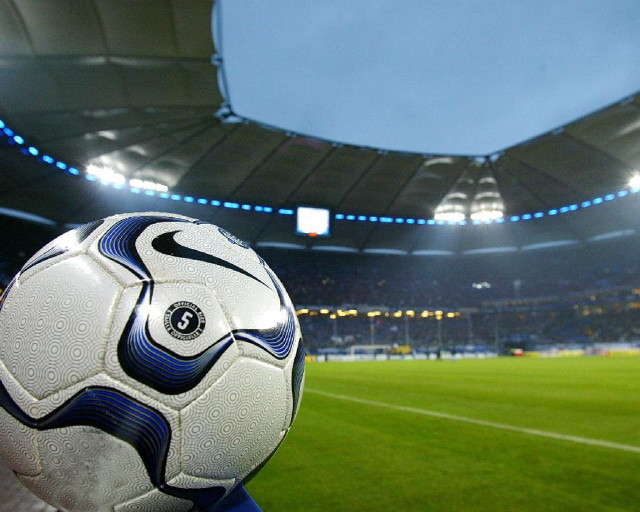 Soccer ball stadium sky background free wallpaper for desktop - medium preview image