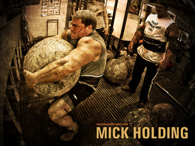 Man holding stone ball gym free wallpaper for desktop - medium preview image
