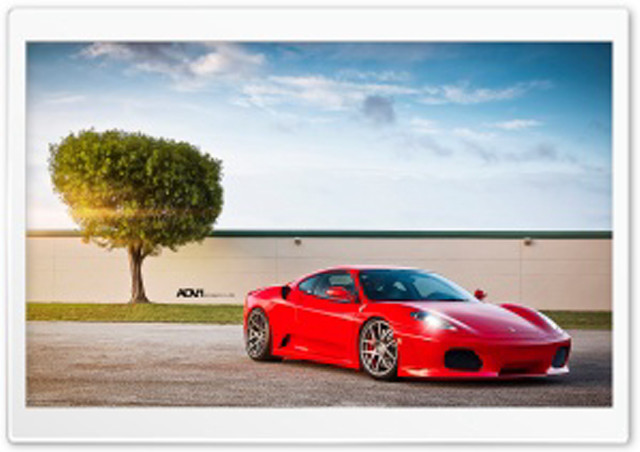 Red sports car tree building free wallpaper for desktop - medium preview image