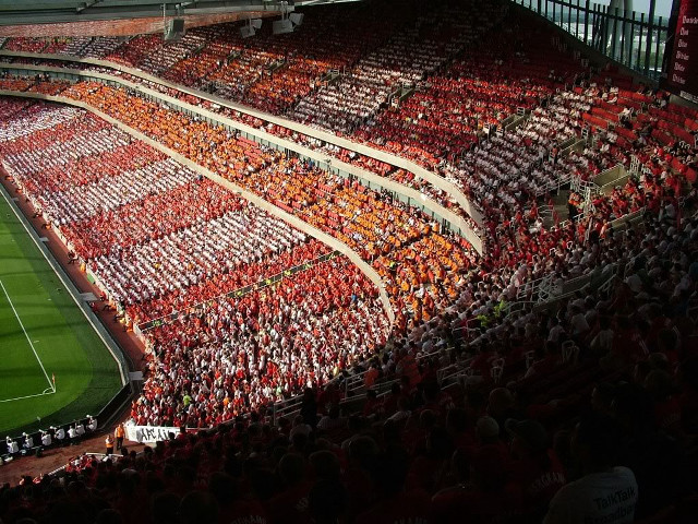 Large stadium filled people sidelines free wallpaper for desktop - medium preview image