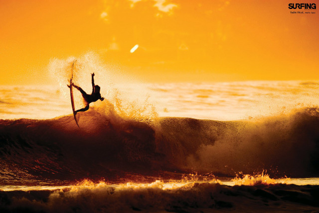 Surfer jumping off wave sunset free wallpaper for desktop - medium preview image