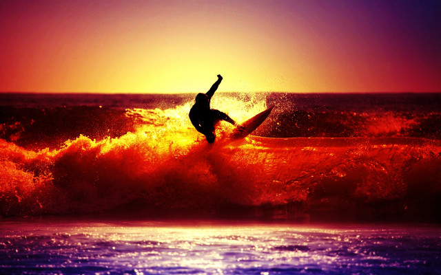 Surfer riding wave ocean sunset #5 free wallpaper for desktop - medium preview image