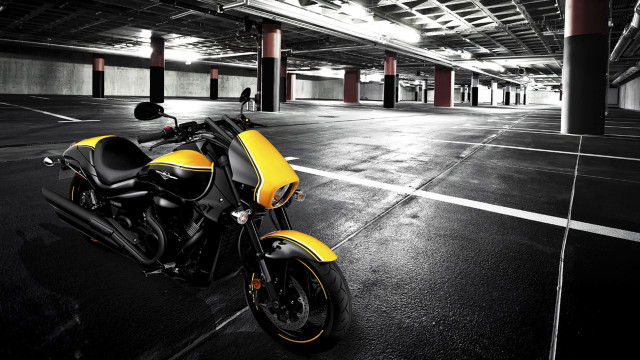 Yellow motorcycle parking garage parking free wallpaper for desktop - medium preview image
