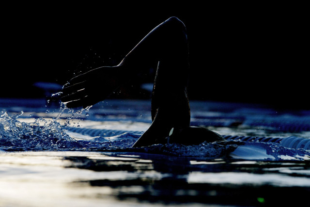 Person swimming water feet arms free wallpaper for desktop - medium preview image