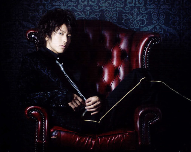 Man sitting red chair sword free wallpaper for desktop - medium preview image