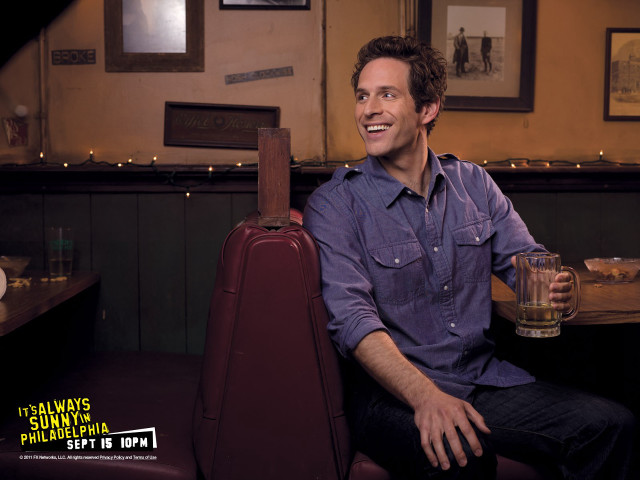 Man sitting booth drink suitcase free wallpaper for desktop - medium preview image