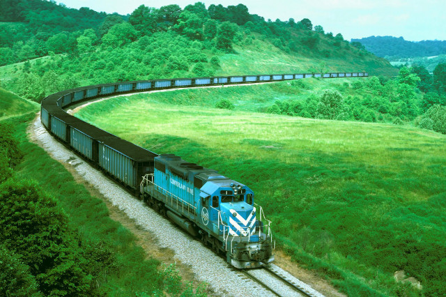 Train traveling countryside green field free wallpaper for desktop - medium preview image