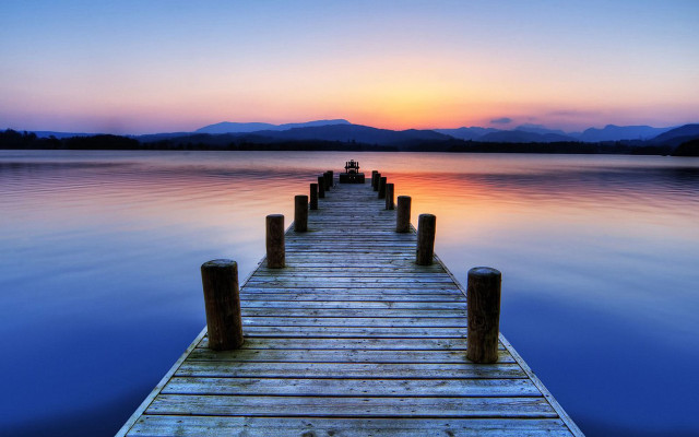 Dock sunset mountains water foreground free wallpaper for desktop - medium preview image