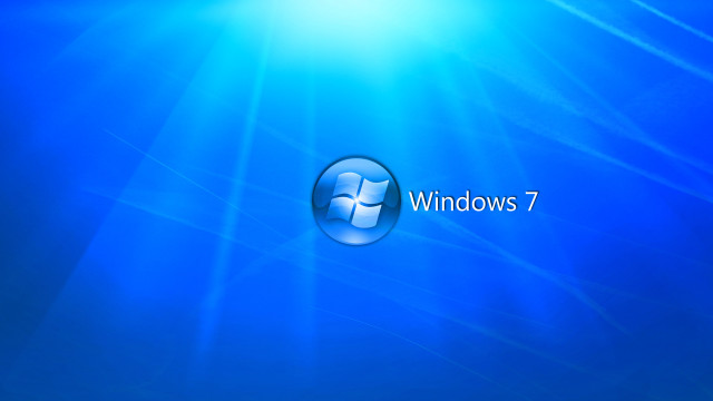 Blue background windows7 logo sunlight free wallpaper for desktop - medium preview image