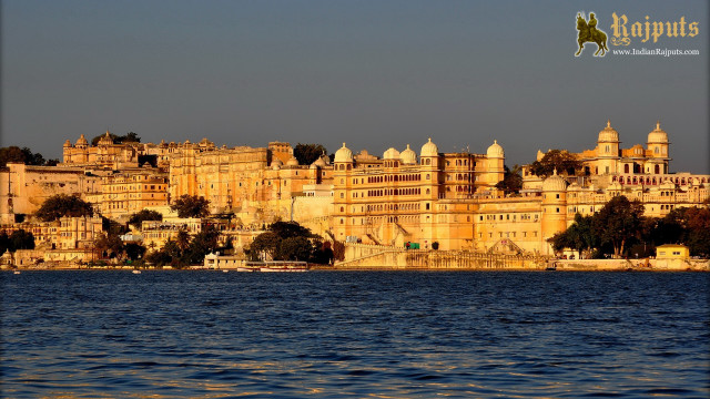 Lakefront cityscape bridge boat building free wallpaper for desktop - medium preview image