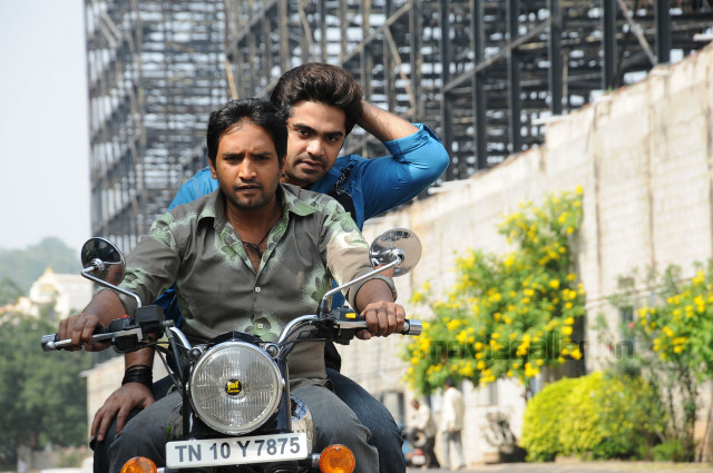 Men motorcycle city street building free wallpaper for desktop - medium preview image