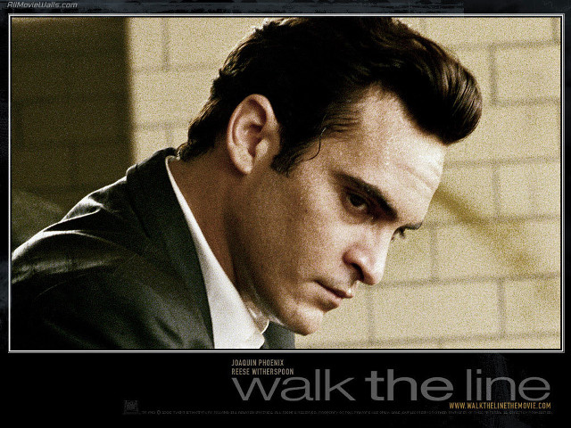 Man suit tie serious expression free wallpaper for desktop - medium preview image