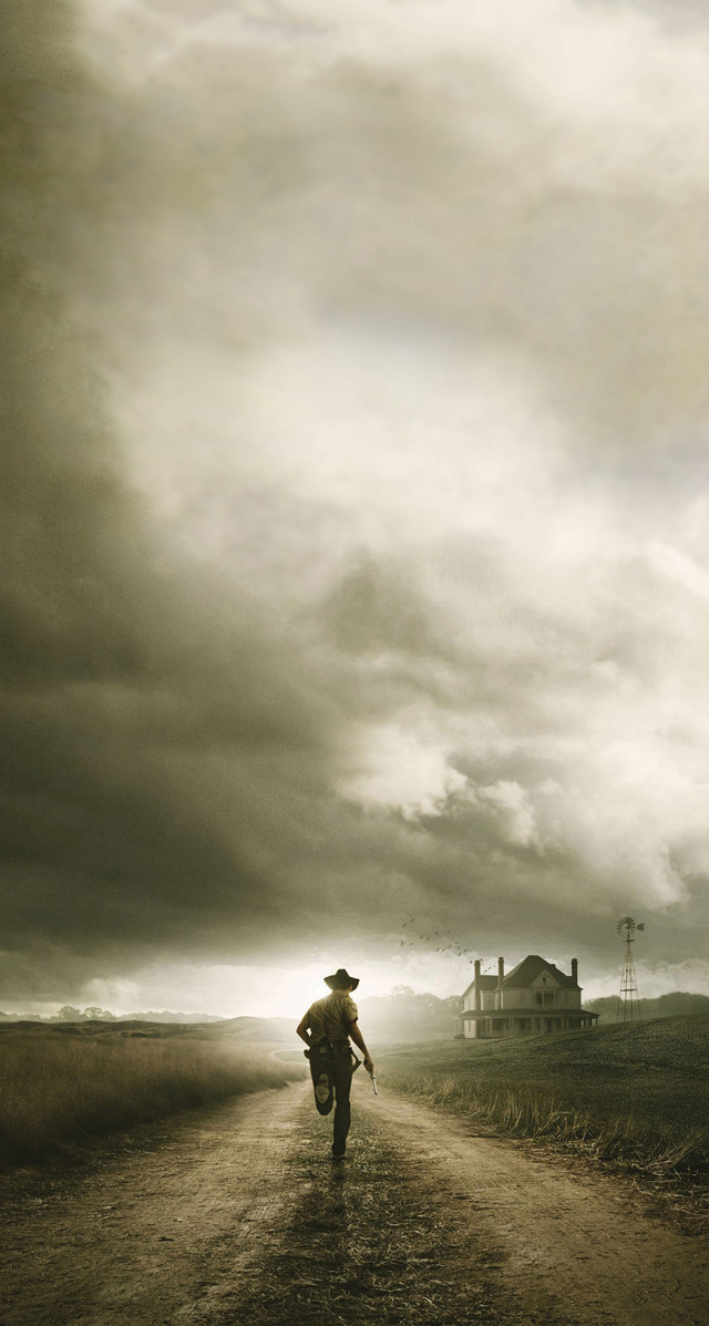 Man walking dirt road cloudy free wallpaper for mobile - medium preview image