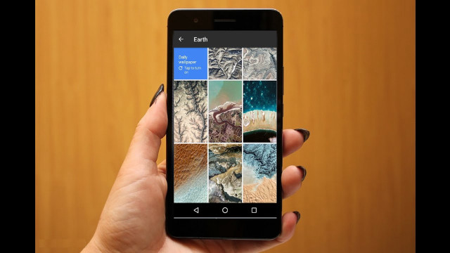 Person holding cell phone image free wallpaper for desktop - medium preview image