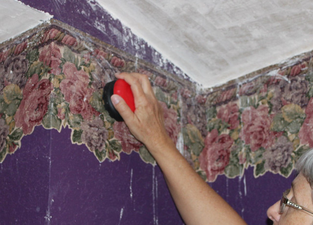 Woman painting wall red sprayer free wallpaper for desktop - medium preview image