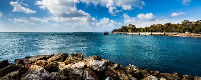 Water rocks dock cloudy sky free wallpaper for desktop - medium preview image