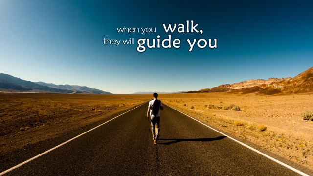 Man walking down road with free wallpaper for desktop - medium preview image