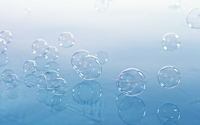 Bubbles floating blue surface water free wallpaper for desktop - medium preview image