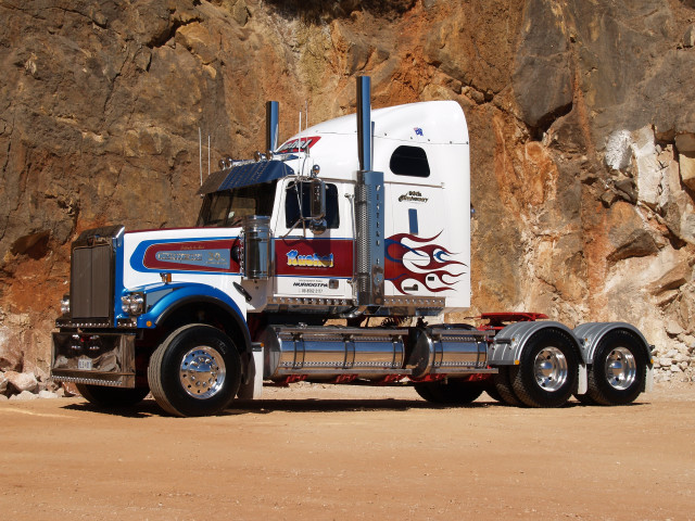 Semi truck rocky cliff red free wallpaper for desktop - medium preview image