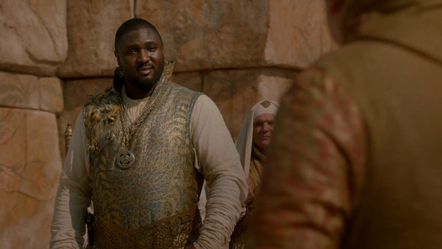 Medieval man stone wall looking free wallpaper for desktop - medium preview image