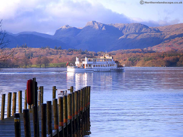 Boat dock mountains clouds trees free wallpaper for desktop - medium preview image