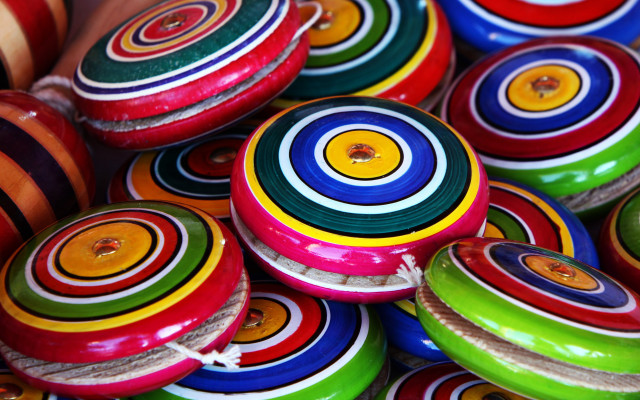 Colorful painted wooden toy discs free wallpaper for desktop - medium preview image
