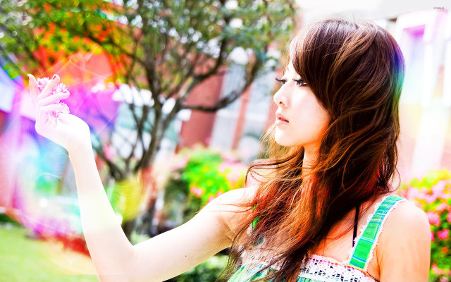 Woman holding colorful kite park free wallpaper for desktop - medium preview image
