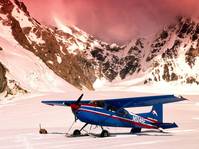 Blue airplane snowfield mountains orange free wallpaper for desktop - medium preview image
