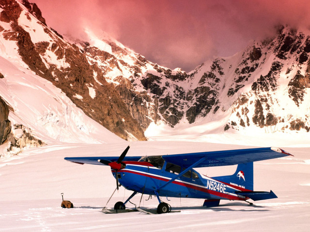 Blue airplane snow field mountains free wallpaper for desktop - medium preview image