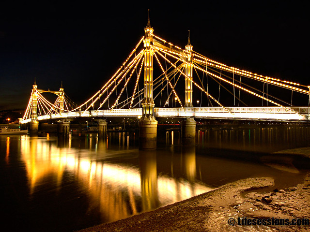 Lit bridge night reflection people free wallpaper for desktop - medium preview image