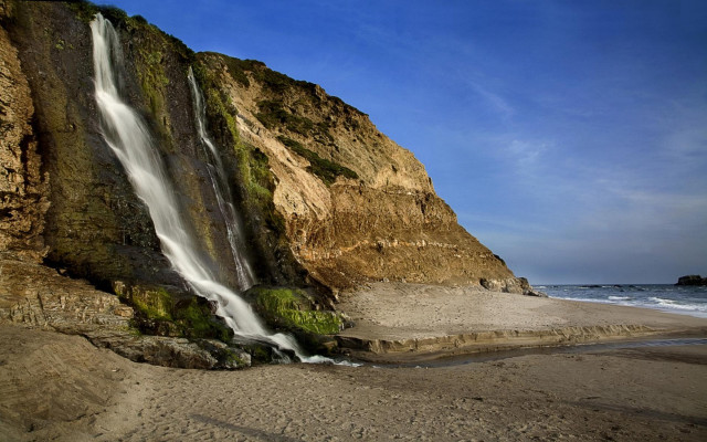 Waterfall cliff ocean sunny blue free wallpaper for desktop - medium preview image