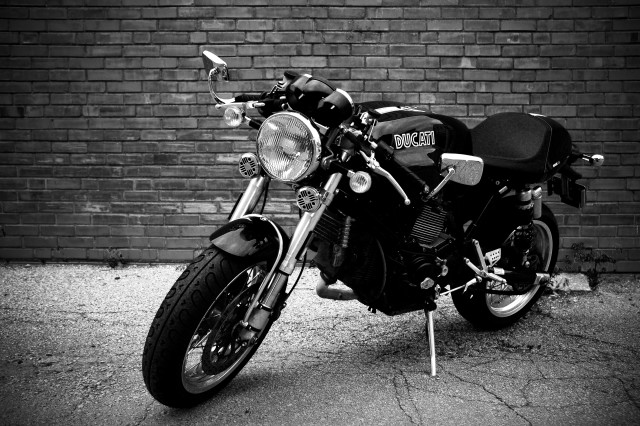 Motorcycle brick wall light black free wallpaper for desktop - medium preview image