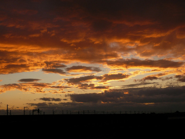 Sunset clouds fence field sky free wallpaper for desktop - medium preview image