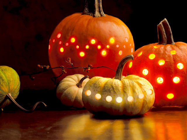 Pumpkins with lights on table #2 free wallpaper for desktop - medium preview image