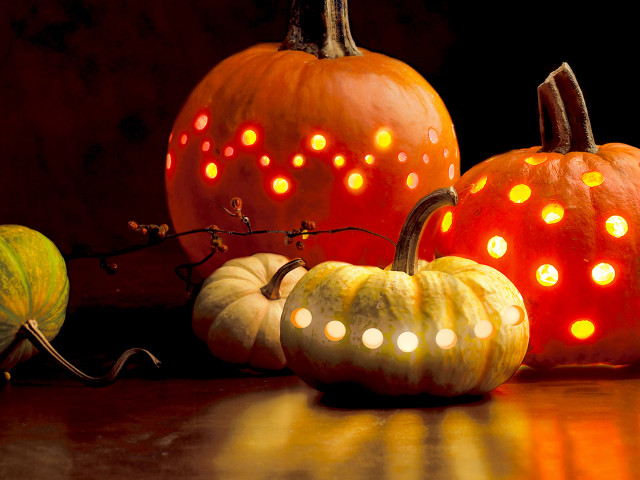 Pumpkins with lights on table #5 free wallpaper for desktop - medium preview image