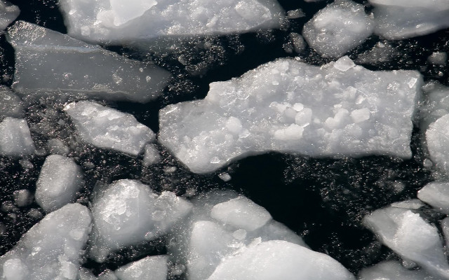 Ice chunks black surface water #2 free wallpaper for desktop - medium preview image