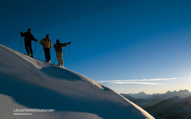 Three people snow slope skis free wallpaper for desktop - medium preview image