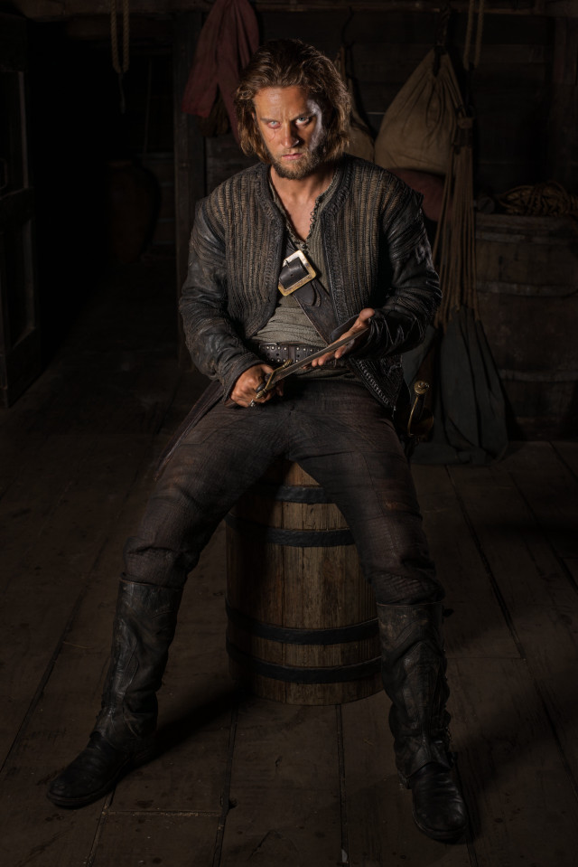 Man sitting barrel wooden floor free wallpaper for mobile - medium preview image