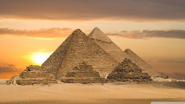 Pyramids sand sunset cloudy sky free wallpaper for desktop - medium preview image